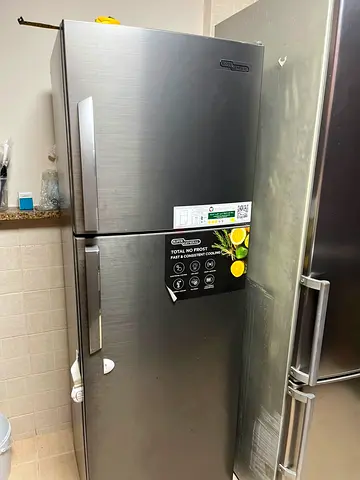 Good condition double-door refrigerator - stainless steel finish