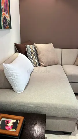 Light beige L-shaped sectional sofa with chaise - good condition
