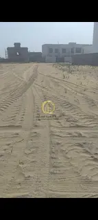 For sale: a residential plot in Sharjah, Al Houshi area, covering 2,422 square feet with an install
