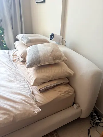 Beige fabric sofa bed (good condition)