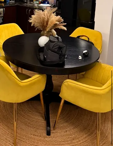 Modern dark brown Round Dining Table  without chair The table opens into an oval and closes into a c