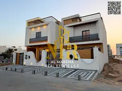 | Own a two-story villa with a rooftop terrace and luxurious finishes in Al Helio 2, Ajman, close to