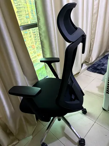 Ergonomic swivel office chair with headrest and armrests - black