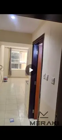A one-bedroom apartment with a living room for sale in Garden City Towers in Al Humidiya, a prime location at literally the lowest price in Ajman.