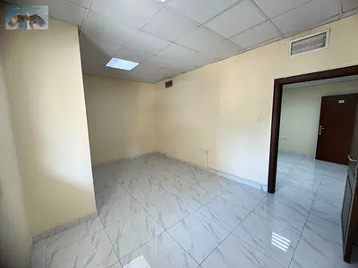 Annual rental apartment in Al Nuaimiya 2 with 1 bedroom, living room, spacious layout, free parking, near Kuwait Street and easy Dubai access.