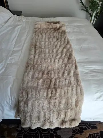 Light beige faux fur throw / bed runner