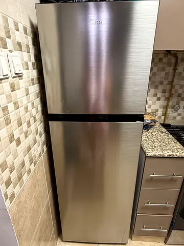 Stainless Steel Top-Freezer Refrigerator - Good Condition