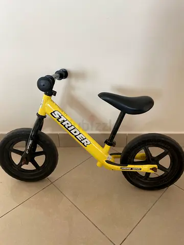 Strider balance bike for toddlers - yellow, good condition