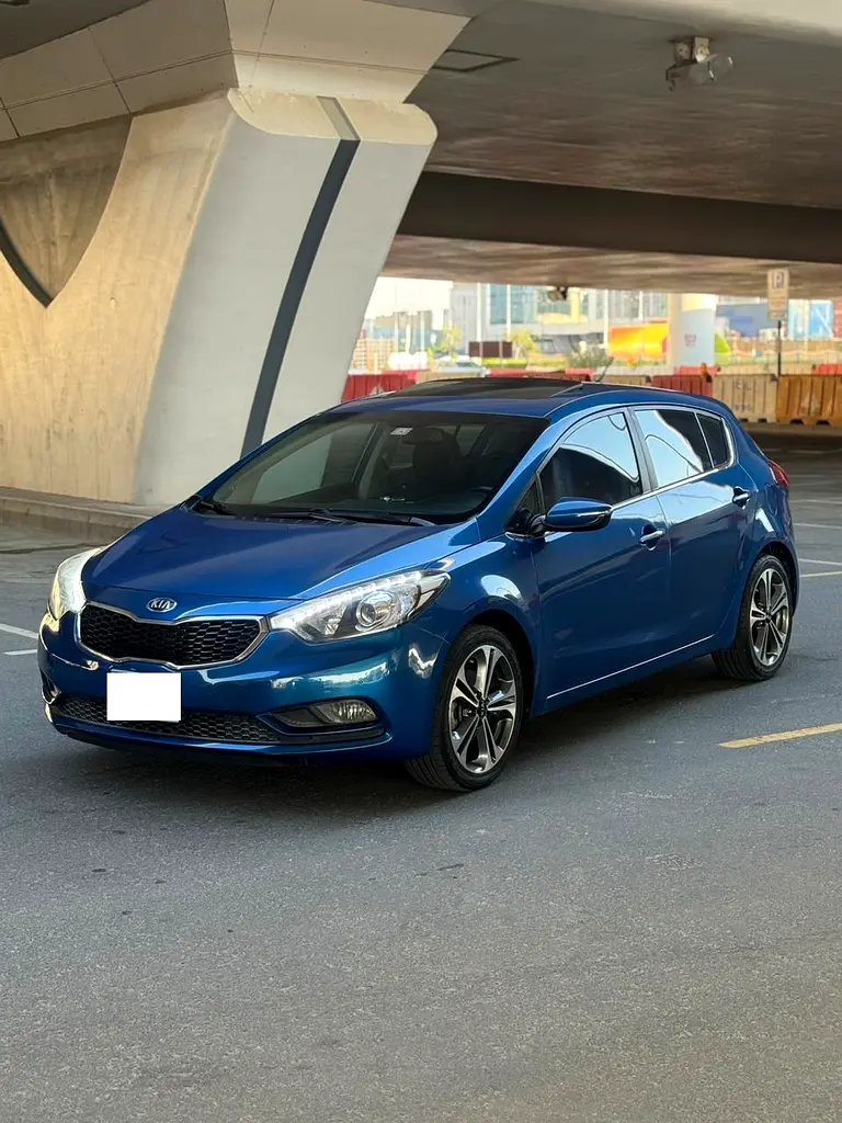 Kia Cerato 2015 — photo 1 of 15