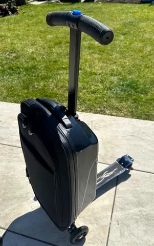 Suitcase with Integrated Kick Scooter - Compact Ride-On Luggage