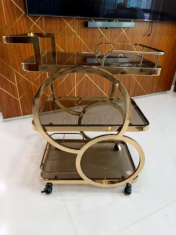 Serving trolley - gold colour