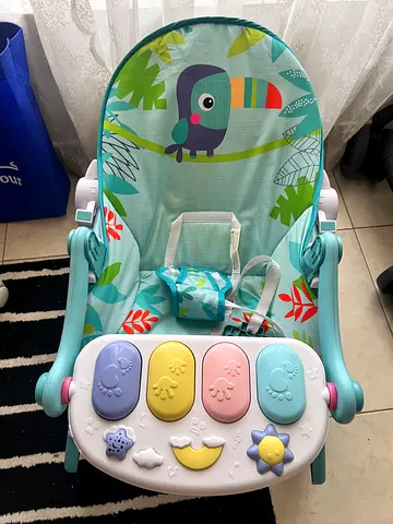 Baby rocker cum seat with toy piano - light blue, gently used
