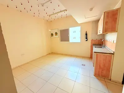 Spacious studio apartment available in the prime location al nabba only 15k for families Window AC central gas family building with free parking