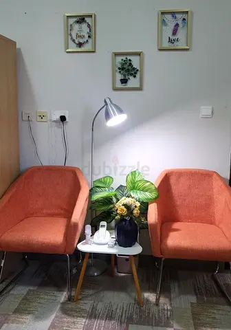 Pair of Orange Accent Chairs with Side Table and Floor Lamp