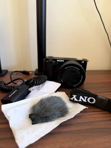Sony EV10 mirrorless camera with lens, mic and accessories - used for 1 week With original packaging