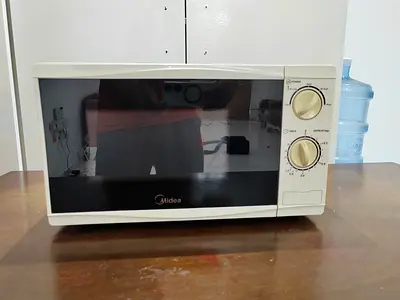 Midea Microwave Oven - Compact Manual Model, Good Working Condition