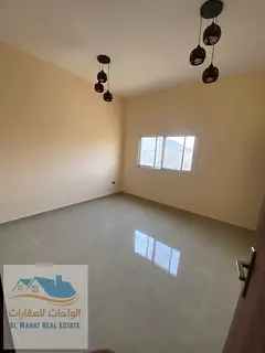 Studio apartment for annual rent with a separate kitchen, near Sheikh Mohammed Bin Zayed Road exit a