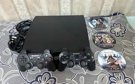 PS3 with 2 controllers,3 games and charging cable,hdmi cable with power supply