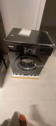 Front load washing machine - brand new, packed piece