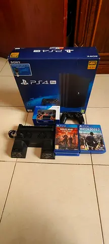 PS4 Pro 1TB console with 2 controllers, 7 games and charging dock - flawless condition