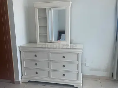 White dresser with mirror on top