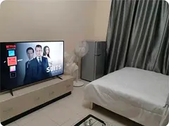 A fully furnished room with attached bathroom and balcony , gym, swimming pool.