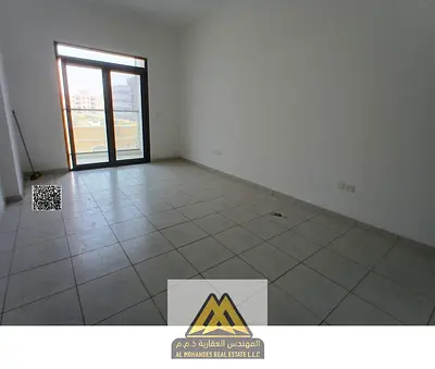 For rent: 2-bedroom apartment in Al Alia, Ajman, 3 bathrooms, master rooms, balcony, free maintenan