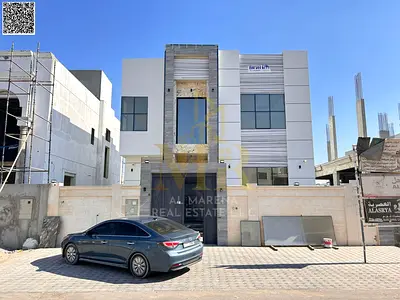 امتلك فيلا مميزه بتصميمات مودرن وتشطيبات شخصيه بمنطقة الزاهيه بعجمان القريبه من الخدمات والمولات والطرق الرئيسيه مع سعر يشمل رسوم التسجيل والتملك فيلا