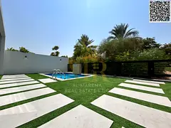 Luxury smart villa for sale in Al Zorah, modern design, private pool, and all services included.