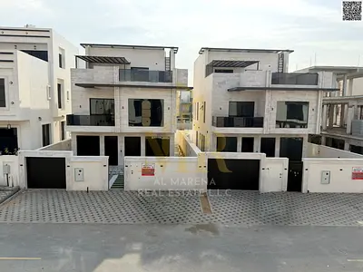 Luxury villa for sale in Al Bahia, two floors and a roof with a swimming pool, all-inclusive price, in one of the most prestigious areas of Ajman.