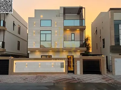 Luxury villa for sale in Al Helio 2, near Azha Compound | Land area 3014 sq ft, built-up area 4000 sq ft | Two floors + roof | 5 master bedrooms + mai