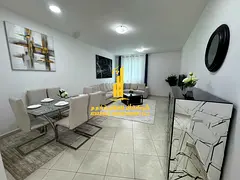 Sea view. Luxurious two-bedroom apartment with a living room and balcony. Ajman Corniche. Fully furn