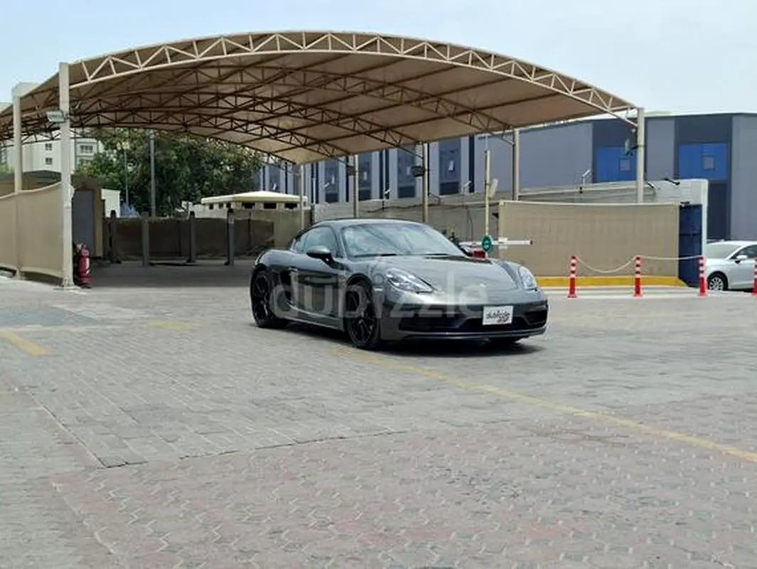 Porsche Cayman 2024 — photo 1 of 12