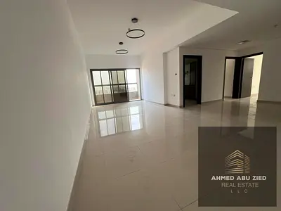 Annual rent: spacious 2BR + hall, first‑tenant unit in Al Jurf 3, directly on Mohamed Bin Zayed Road. Central AC, 2 master bedrooms, 3 bathrooms, open