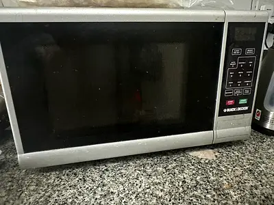 Used Silver Countertop Microwave Oven - excellent Working Condition for 150