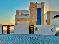 Own your dream villa Modern design with a roof , registration fees included . Close to the mosque an
