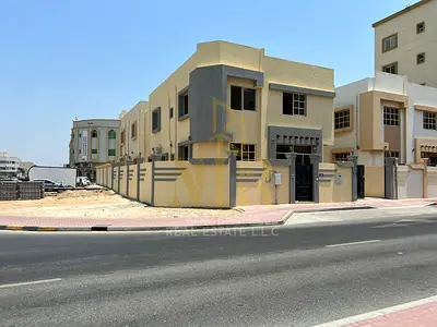 Villa for sale in Ajman, Al Rawda 3. 5 master bedrooms, majlis, living room, and maid's room. Freehold ownership for all nationalities. Bank financing
