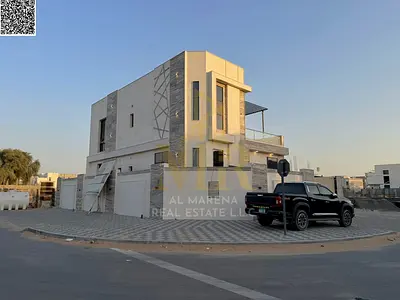 Luxury villa for sale in Al Helio 2 | Two floors + roof | 4 master bedrooms | 3,000 sq ft | Modern design | Includes registration and ownership fees |