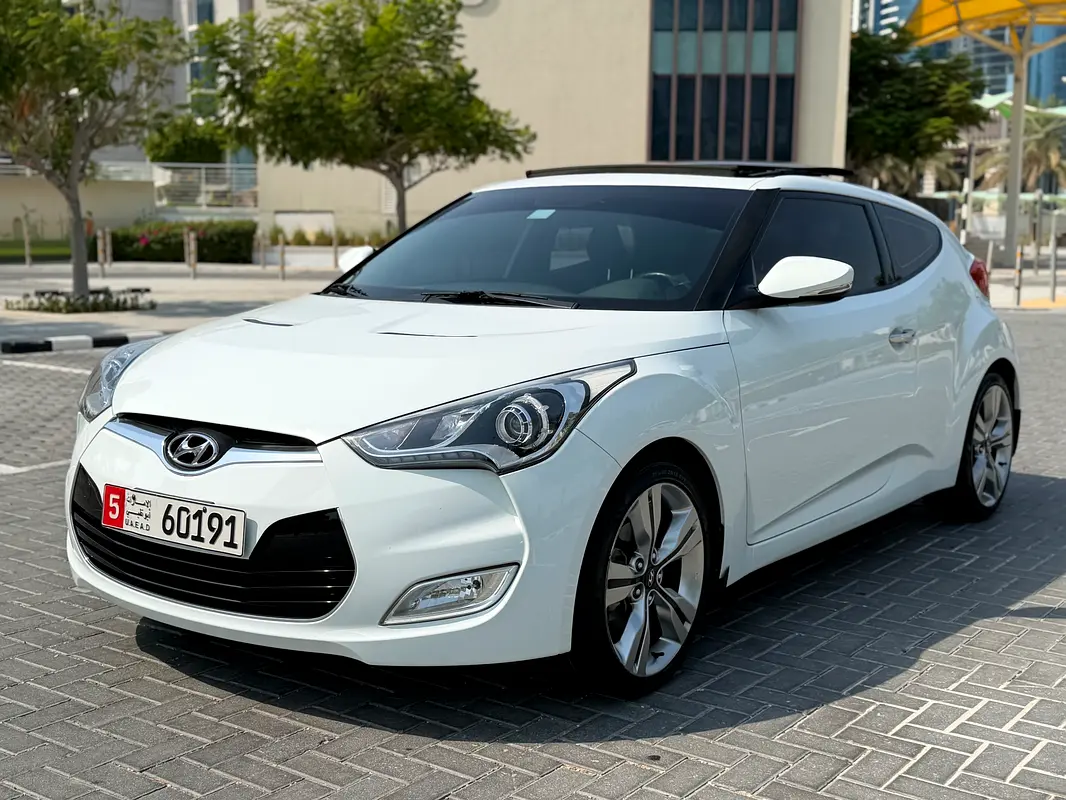 Hyundai Veloster 2014 — photo 1 of 17