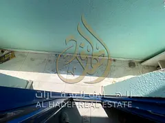 2BR in Al Bu Tina, open-view balcony, central AC & gas, near all services, garbage room, daily c