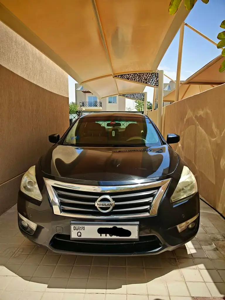 Nissan Altima 2013 — photo 1 of 4