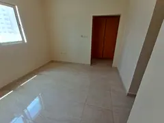 Apartment for annual rent in Al Majaz 3, Al Taawun area, equipped with 2 bathrooms, built-in wardrob