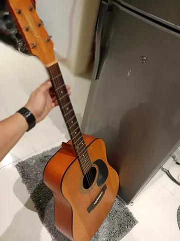 Used Natural Finish Acoustic Guitar - Good Condition