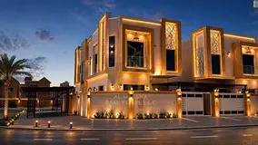 Corner villa for sale in Al Muwaihat 2, modern design, spacious areas with a yard and outdoor seatin