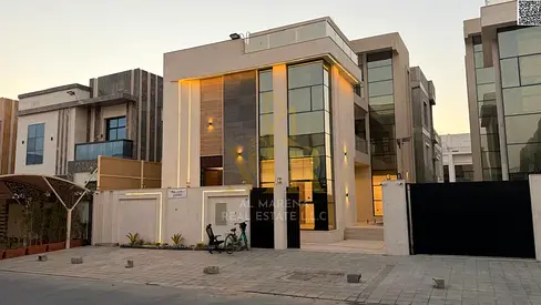 For sale: A distinctive villa in Al Yasmin area - Ajman, with custom finishes, next to the park, two floors and a roof with a swimming pool, freehold