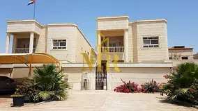 Villa in Al Muwaihat 2, commercial use, two floors and a roof, 6 bedrooms, price includes electricit
