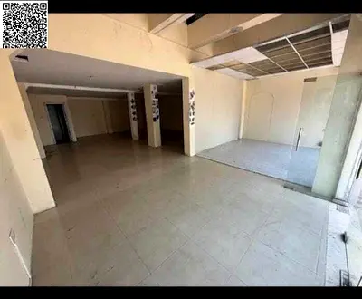 Here's the accurate English translation: **Shop for Annual Rent in Al Rashidiya 3 – 1,100 Sq. Ft.**