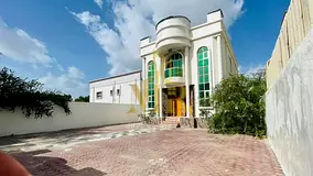 A distinctive villa for sale in Al Rawda 3 with a large yard and high-end finishes. The price includ