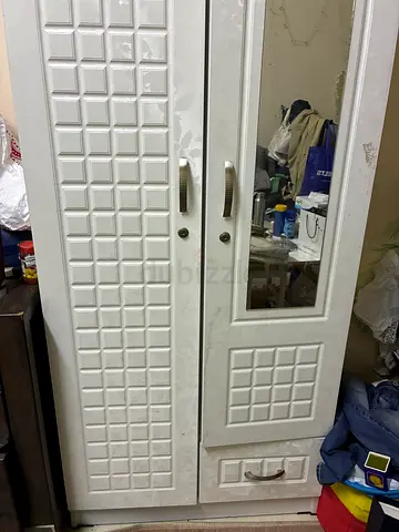 White 2-door wardrobe with mirror — good condition, key available for both doors