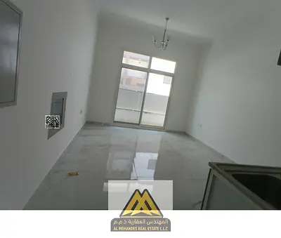 Annual rental: Studio in Al Jurf 3 Ajman, second tenant, central AC, balcony, near China Mall, AED 22,000, 4/6 installments.